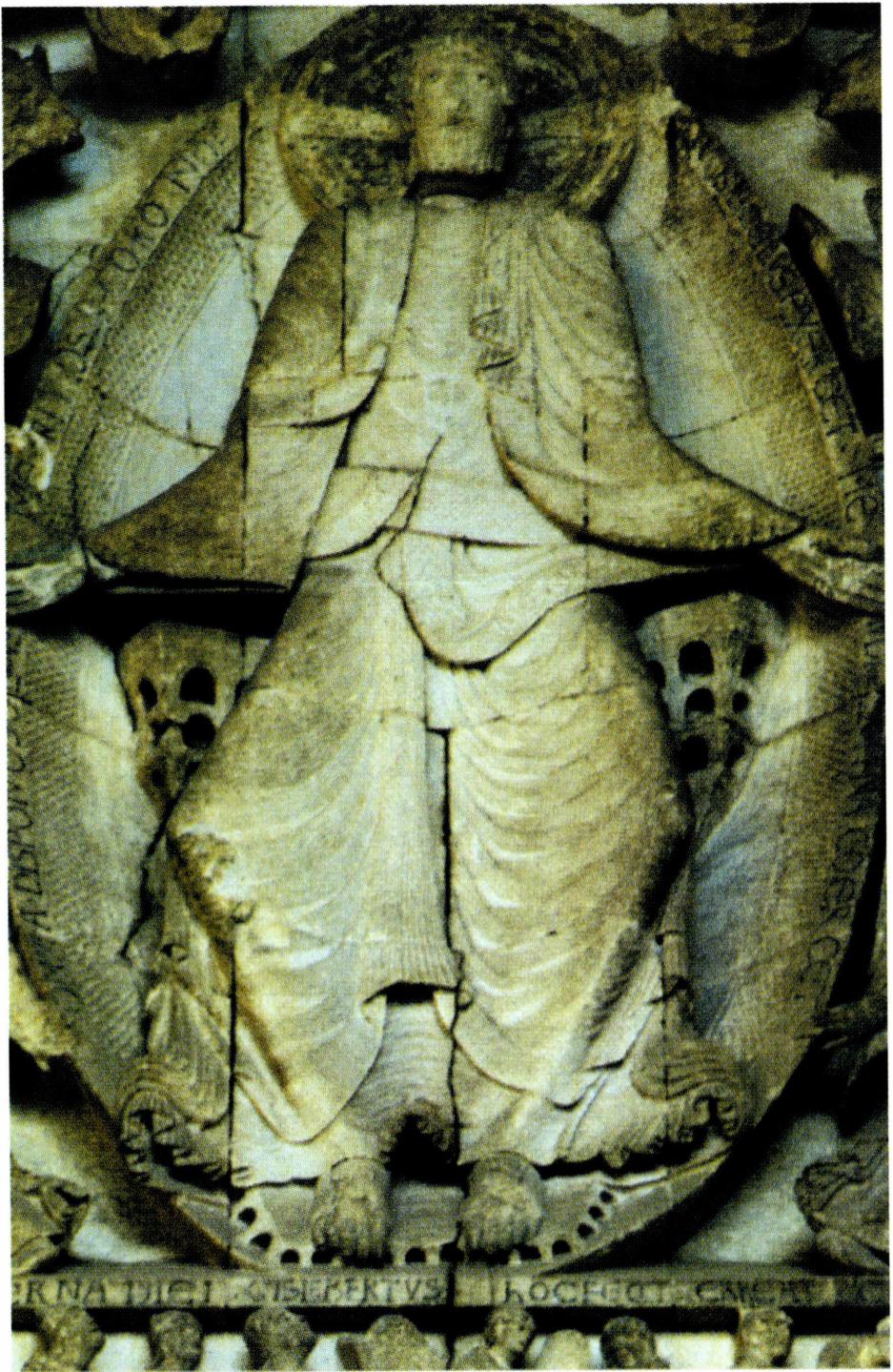 지슬베르가 자신의 서명을 남긴 오통의 주교좌 성당 서쪽 팀파늄 (예수의 발 아랫부분) .